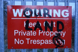 Freeman's Wood - defaced Keep Out sign - Our Land